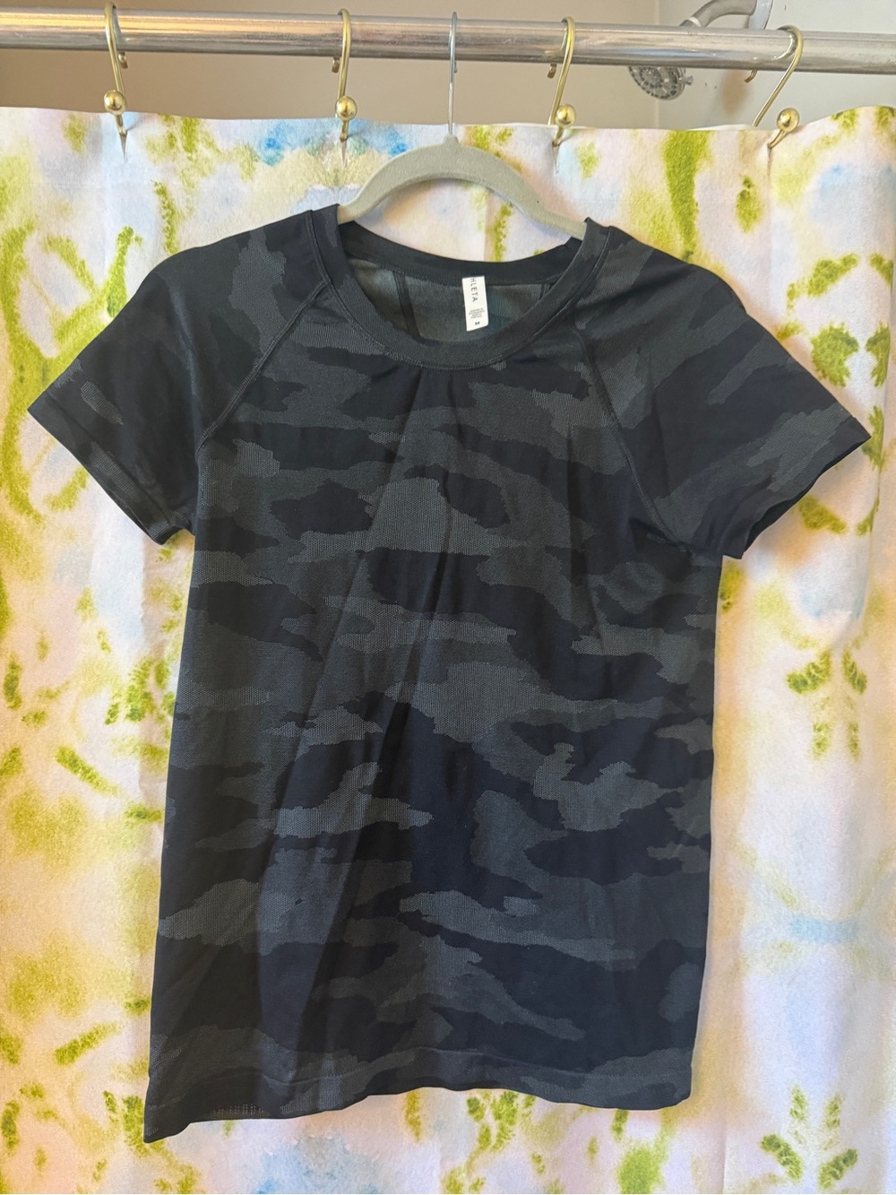 Athleta Women’s short sleeve tee. Size medium. Camo
